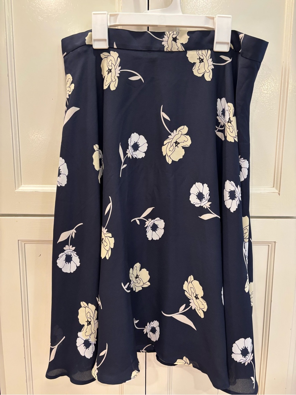 Ann Taylor navy A-line skirt, cream and yellow flowers